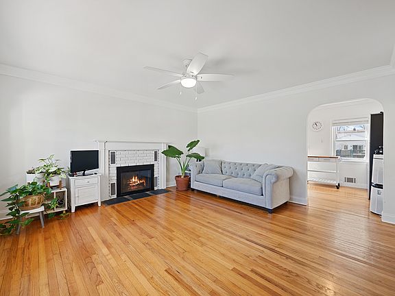 LIVING ROOM WITH BEAUTIFUL WOOD FLOORS