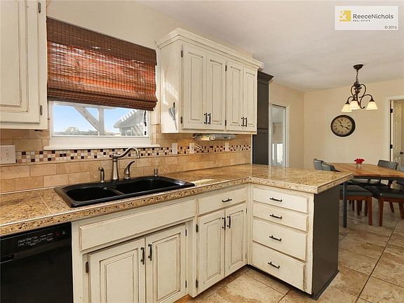 Remodeled kitchen with sunny kitchen window.