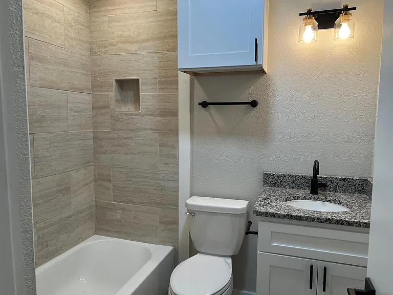 Granite Counters, hidden wall storage behind door