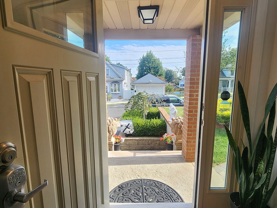 Main entrance door facing the street.
