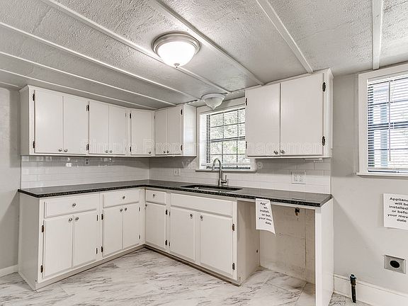 5th image of 9706 N Garnett St