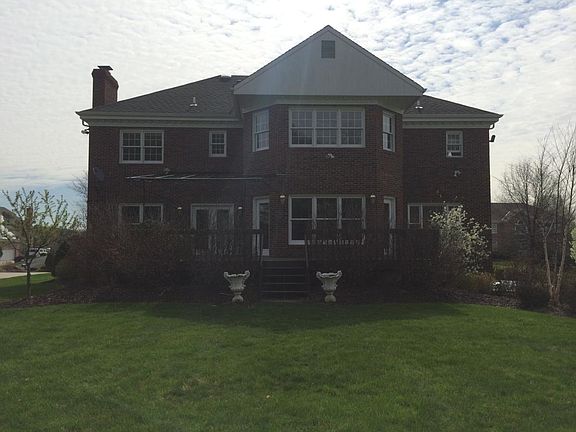 DECK ACCESS FROM KITCHEN AND FAMILY ROOM