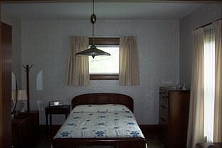 Formal dining room - currently temporary bedroom.