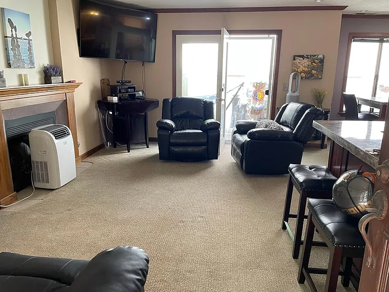 Living area with gas fireplace.