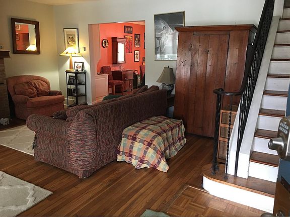 View from front door with antique wardrobe.