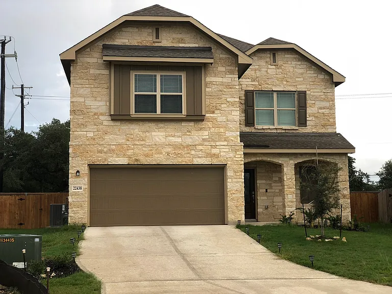 Welcome home _ charming curb appeal in the gated Wortham Oaks community