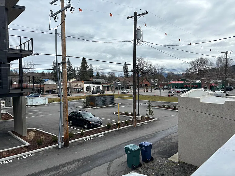 Paved alley for garage access and views of Capone's Pub and Grill. Walking distance to Safeway and Ace hardwhere and so much more.