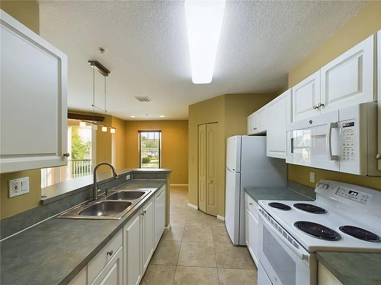 5020 Fairways Cir #J205 — Photo 13