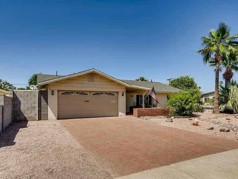 Two car garage & big driveway for even more parking on a sweet corner lot in Tempe, close to ASU, restaurants, groceries, library, museum & freeways!