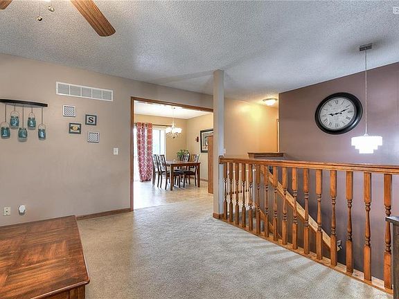 The living room looking into the kitchen area