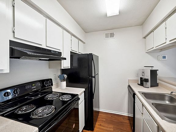Kitchen with Black Appliance Package