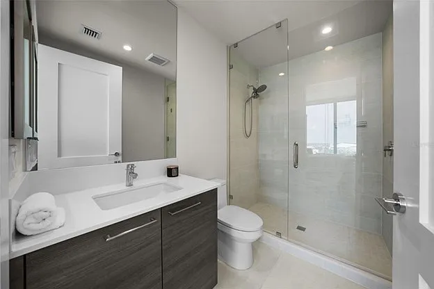 Second bathroom ensuite with walk in shower.