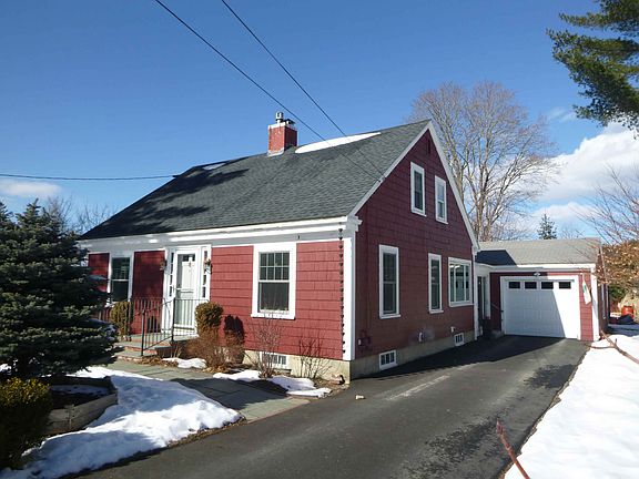 Exterior with driveway and garage