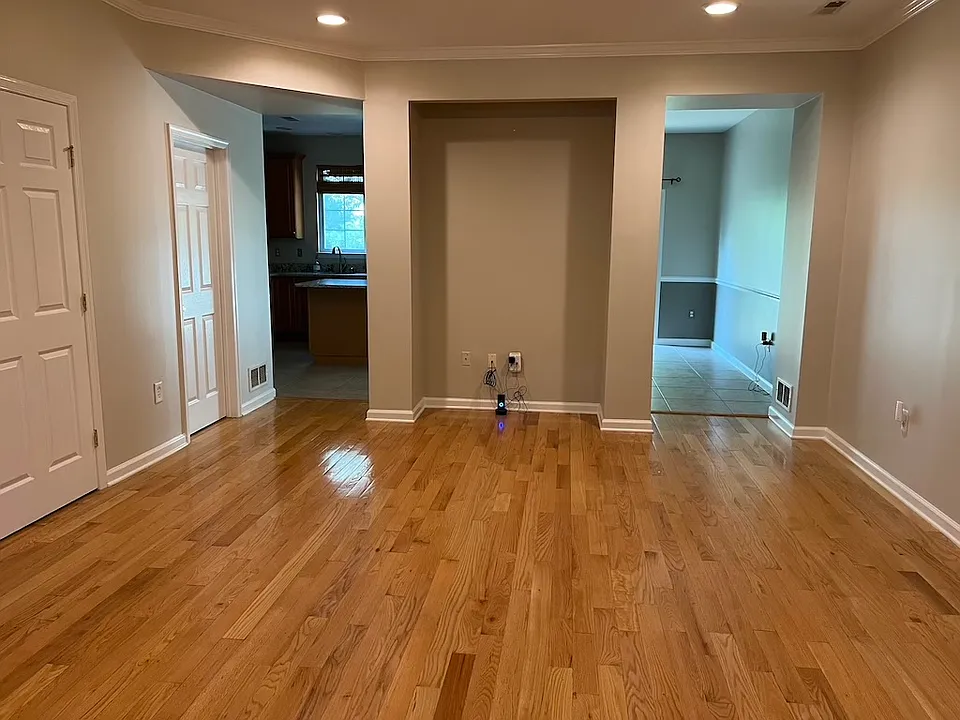 Living room with gleaming wood floors