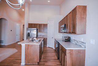 Spacious open kitchen with large pantry.