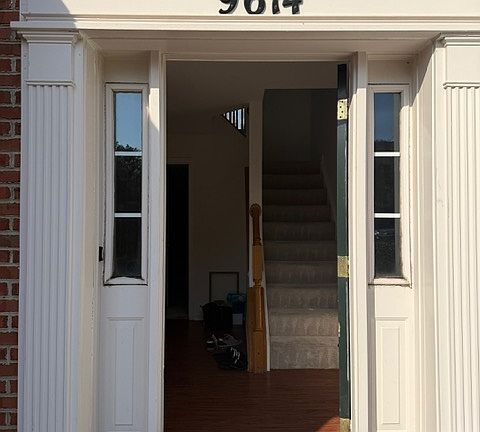 Front Door opens to main level with a bedroom and laundry