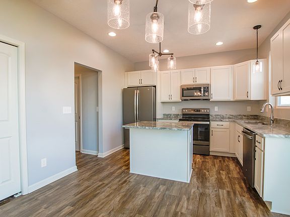 Floor plans and photos shown may include base features along with additional options and upgrades.