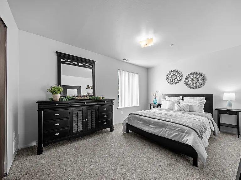 Big bedroom with natural lighting at Westwood Village Apartments in Westland, MI