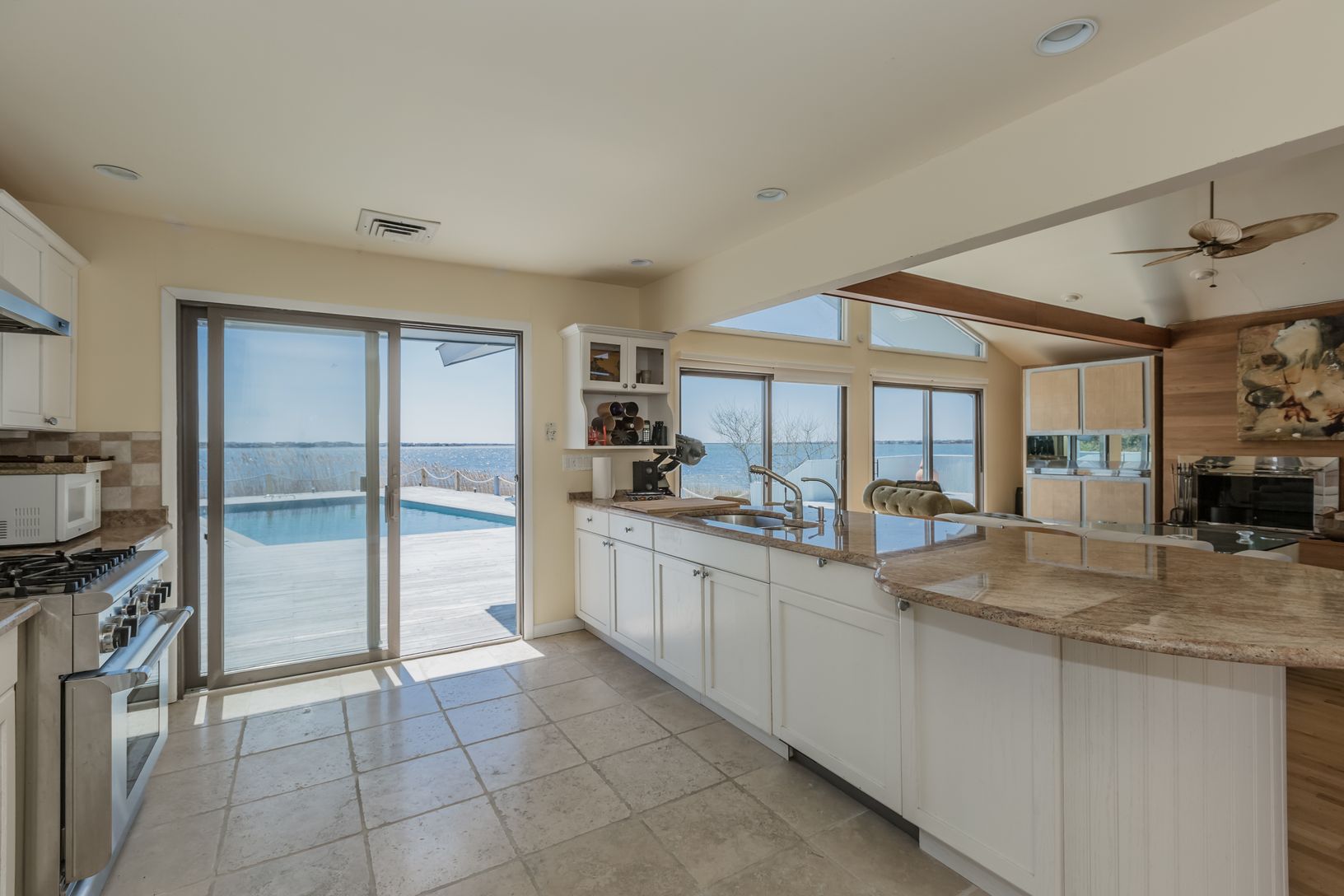 Open plan Light filled kitchen features gas cooking and spectacular views
