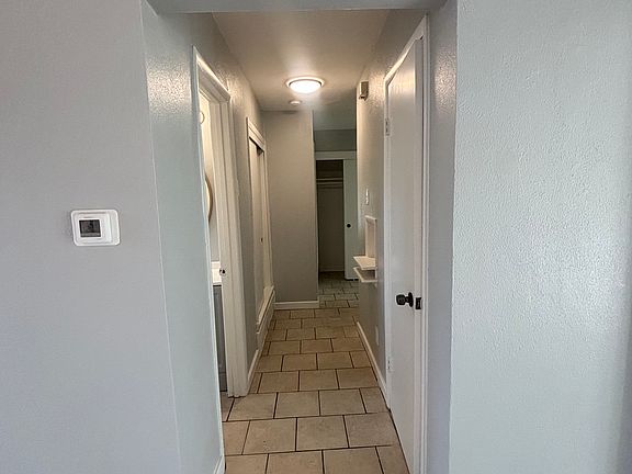 Hallway to bedrooms and bathroom