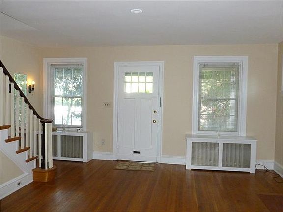 Spacious Living Room w/ Hardwood Flooring