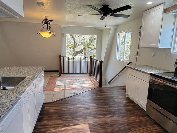 In the kitchen looking towards the stairs going down to the bedrooms