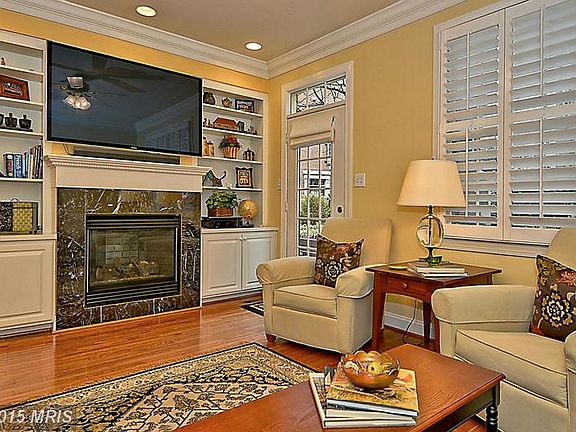 Elegant living space with built-ins and gas FP!