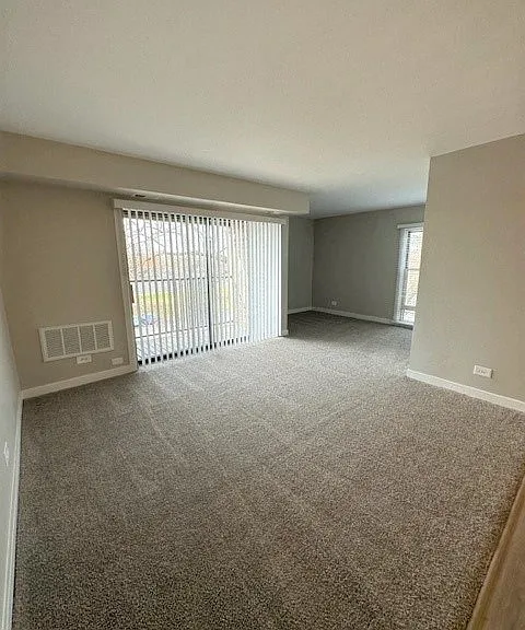 Spacious Living Room With Attached Den