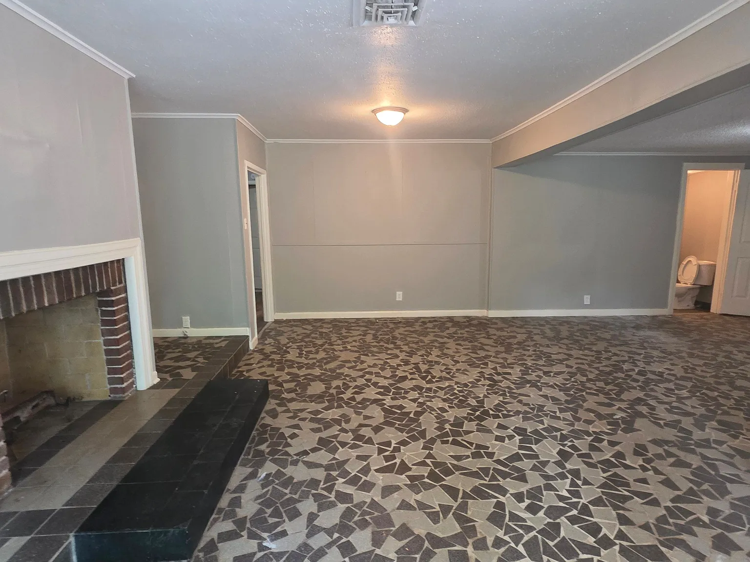 Spacious Split-Level Home with Fireplace, Bonus Room & Outdoor Living — Photo 2