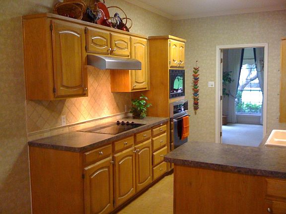 Updated vent, cooktop, counter and back splash