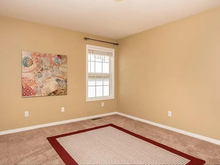 two smaller bedrooms are on one side of the house