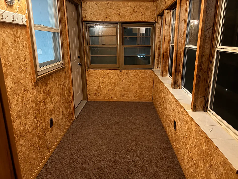 Private entrance into a cozy sunroom.
