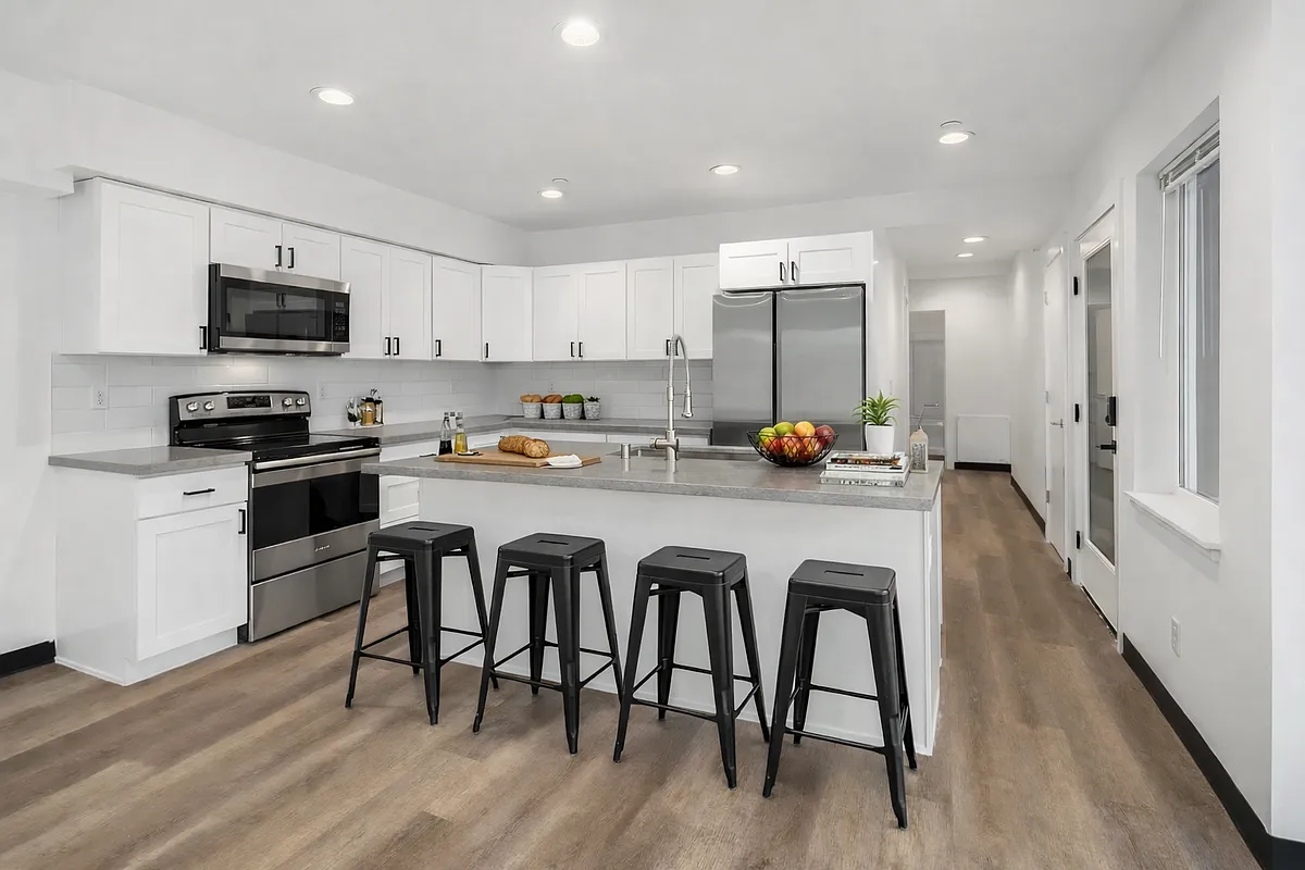 Kitchen comes furnished with barstools, pots, pans, cups, glasses, plated, utensils, small appliances, etc. - 5004 7th Ave NE #C
