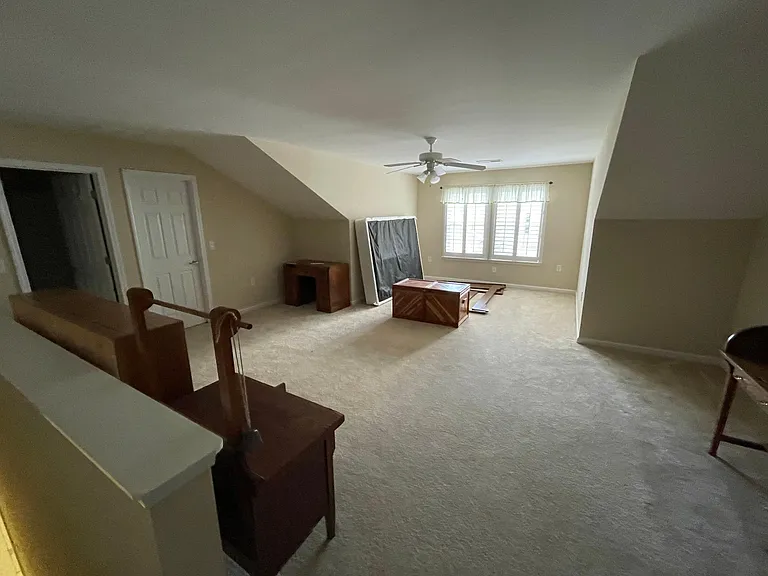 Upstairs Bedroom (or bonus) with full bath. Furniture not included.