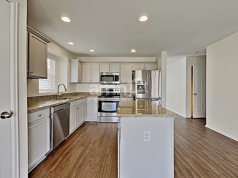 9853 E 112th Dr — Photo 3