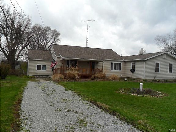 Extra parking on the left side of the front of the house. The old garage was converted to a bonus room. Could be extra bedroom with the addition of a closet/ Play room/man cave/ craft room ect.