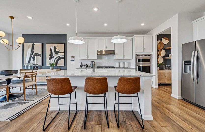 Kitchen with Pendant Lighting and Stainless Steel Appliances