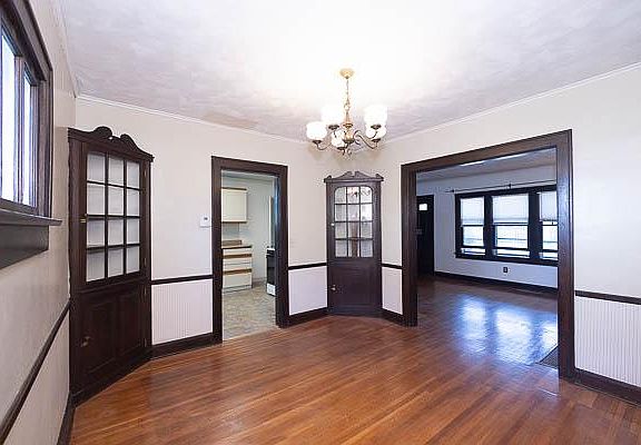 Dining room--Lots of original character and hardwood floor throughout!