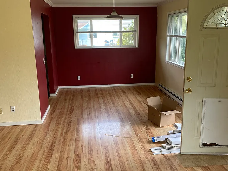 lots of windows in light and bright Living room and dining room