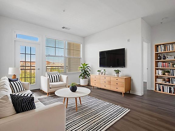 From morning coffee to movie nights, this light-filled living space is designed for comfort