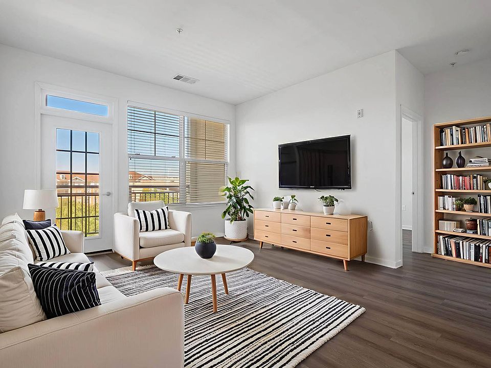 From morning coffee to movie nights, this light-filled living space is designed for comfort