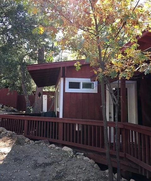 This is the front door to the unit as well as the partially covered patio as well.