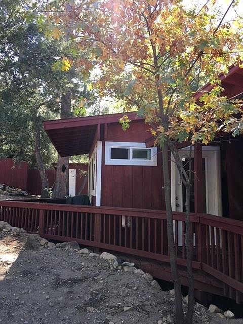 This is the front door to the unit as well as the partially covered patio as well.
