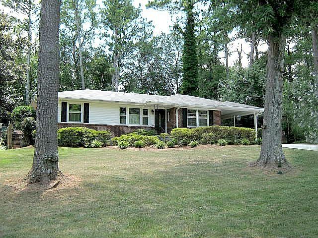 Totally renovated brick ranch. New roof, driveways & systems