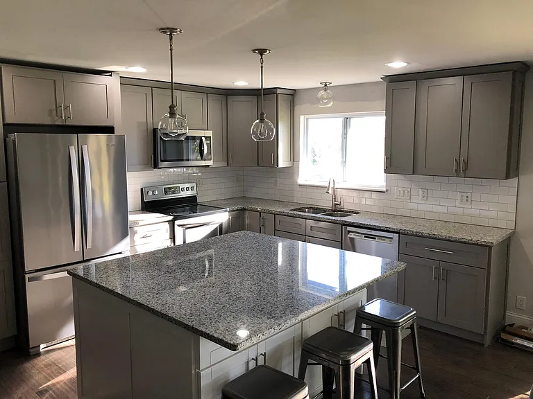 Kitchen showing great cabinet space, granite counter tops, large island, stainless steel appliances.