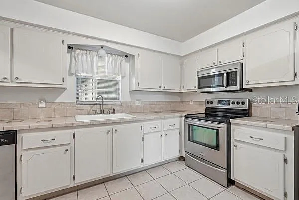 1706 Belleair Forest Dr #136 — Photo 11