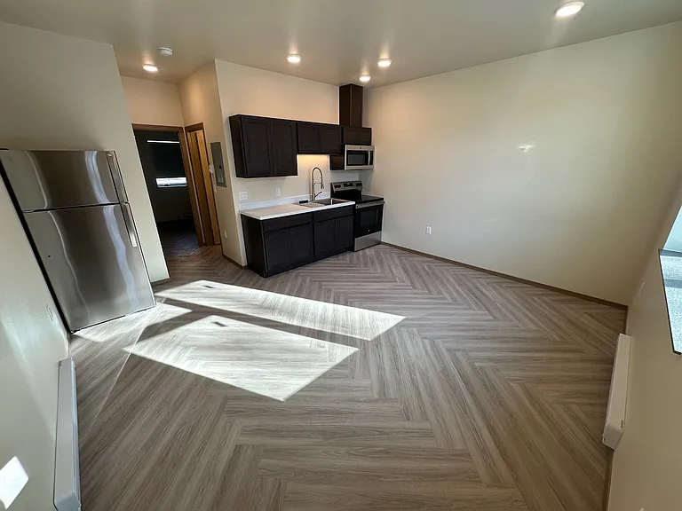 Living Room & Kitchen. Photos are now of the actual unit.