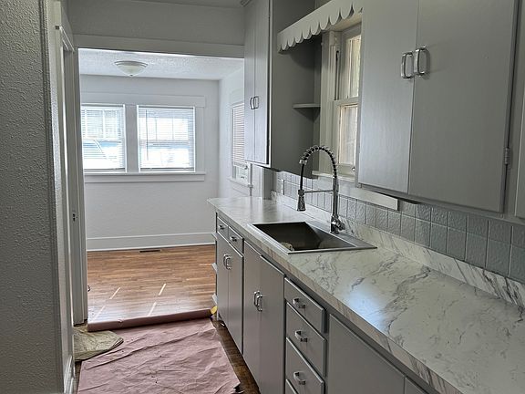 Kitchen looking into breakfast nook