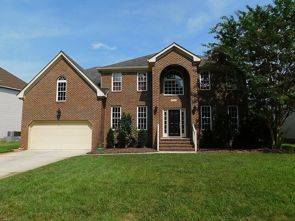 Two story brick Transitional
w/ two car garage