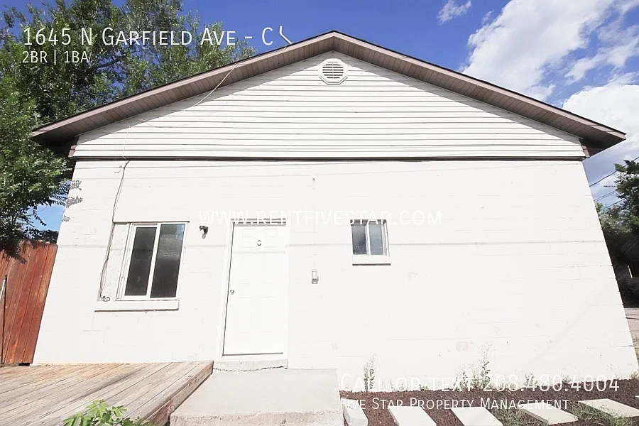 Spacious & Private 2 Bedroom, 1 Bathroom End-Unit Apartment with Garage, Shop & Patio! — Photo 2